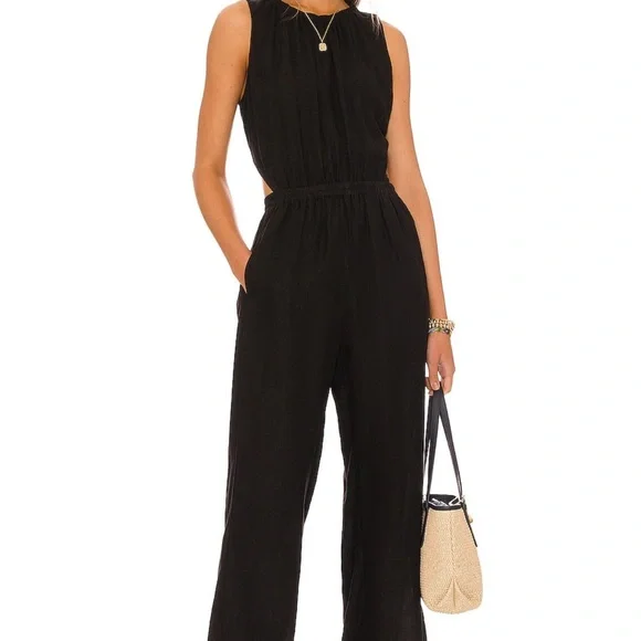 Black jumpsuit! Used for a one time event,washed,cleaned and ready to go!